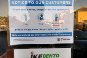 Caution of coronavirus poster at restaurant in the US