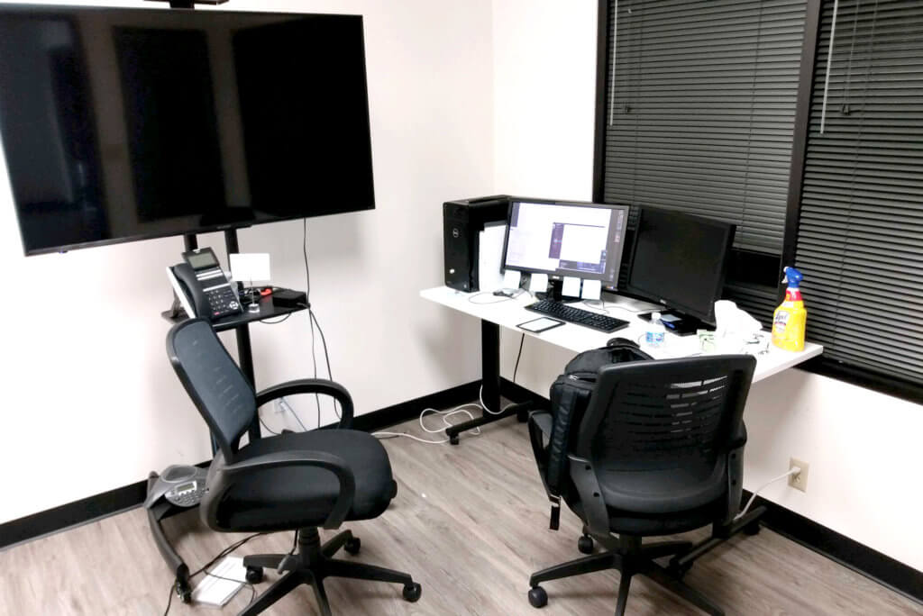 A Working place, there is desktop at the office in Torrance