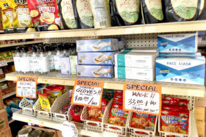 There are Masks, Gloves and Hand Sanitiser at the supermarket under effects of the Coronavirus