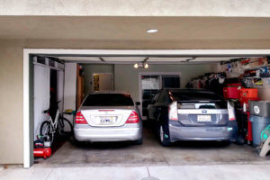 There are cars and bike at garage in Torrance