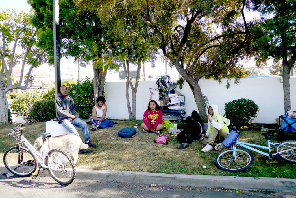 Homeless peop;e on the grass in Torrance LA, California