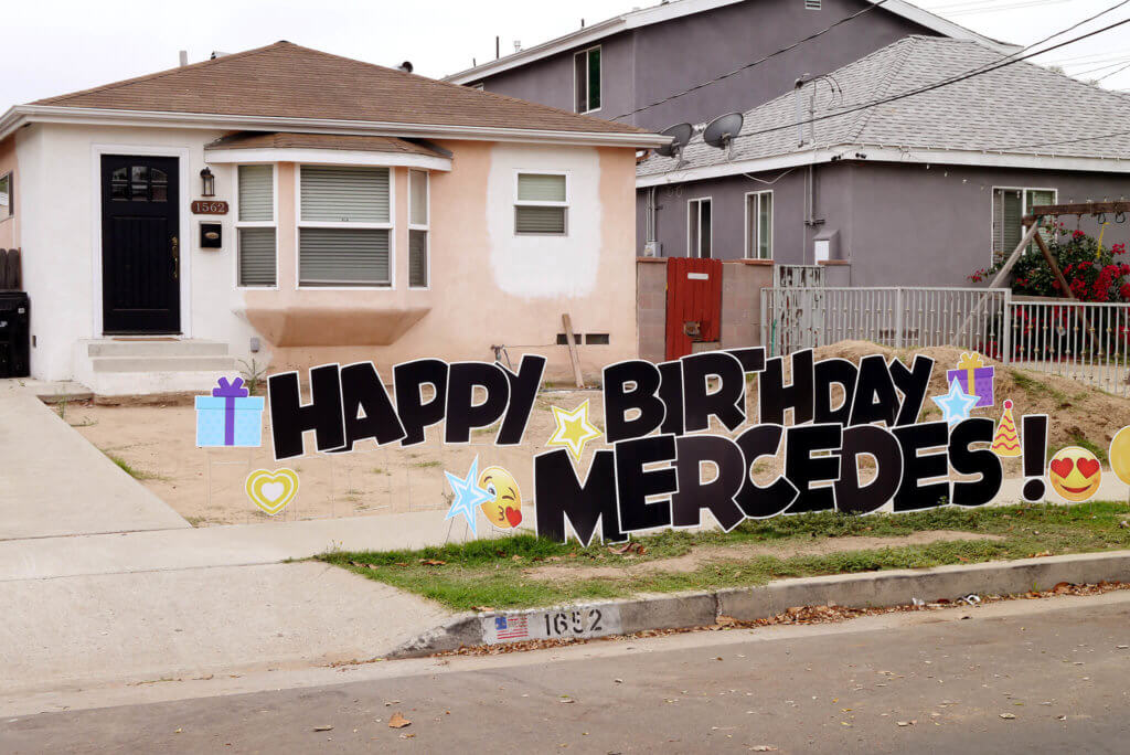 The borad of happy birth day on the house yard in Torrance
