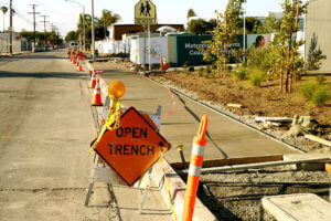 Open trench sign board on the road in Torrance