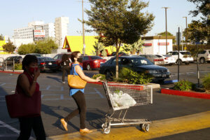 People at front of the supermarket under effects of the coronavirus in Califronia