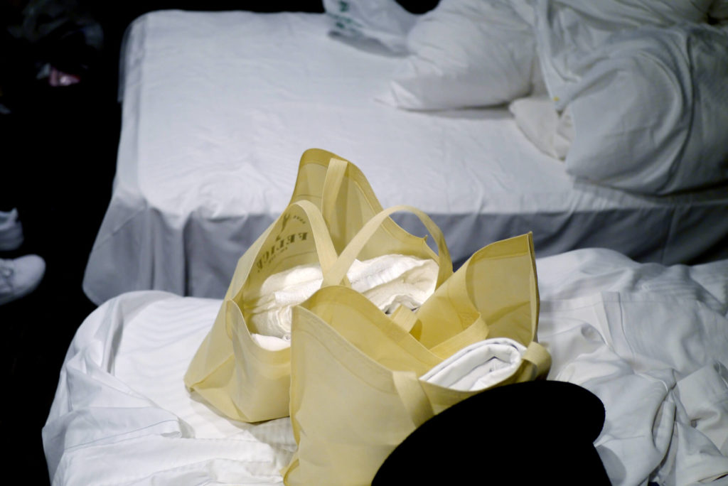 sheets and towels on the bed in Japan's hotel