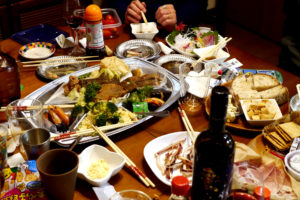 Many Dishes and Liquors on the table