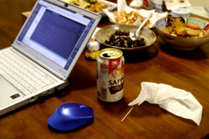 laptop and beer on the table