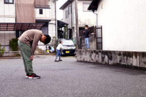 Playing kids at a car park in Japan Hiroshima