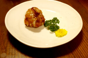 Deep fried chicken and Chrysanthemum on the plate