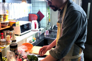 A man is cooking in the Japanese kitchen