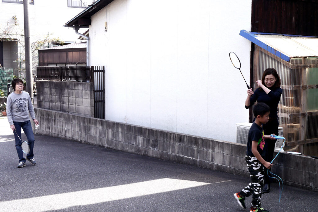 Play badminton at car park in Hiroshima Japan