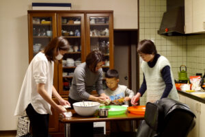 Preparing gyoza together in the kitchen