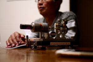 Stirling engine with dad on the table