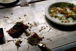 leftover hiroshima okonomiyaki on the food grilled on an iron plate