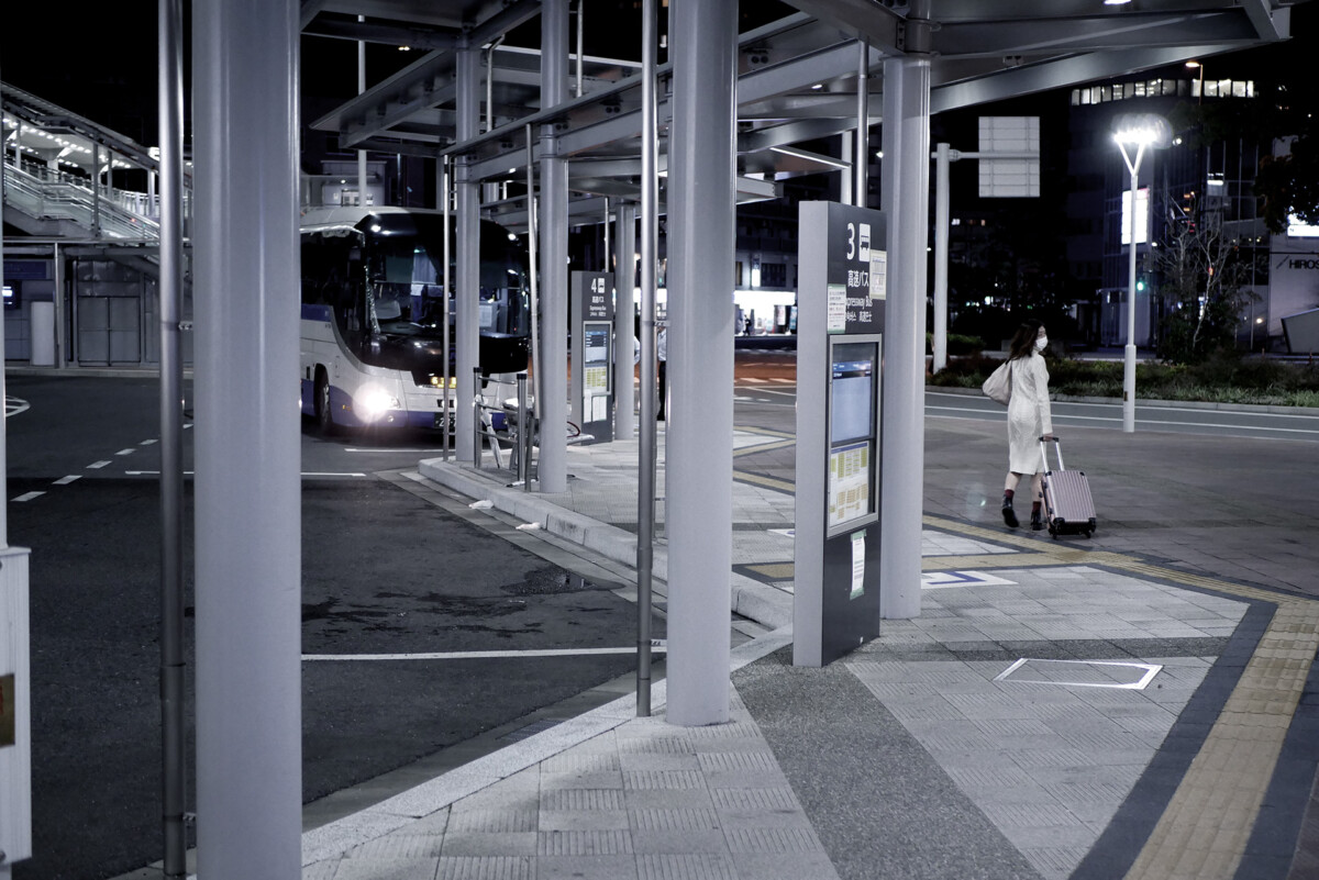 Bus station An woman is going to take an express bus at the bus station in Hiroshima Japan