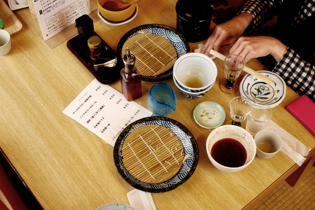 Table after eating Japanese soba (Nihachi-jyuroku) with women's hands