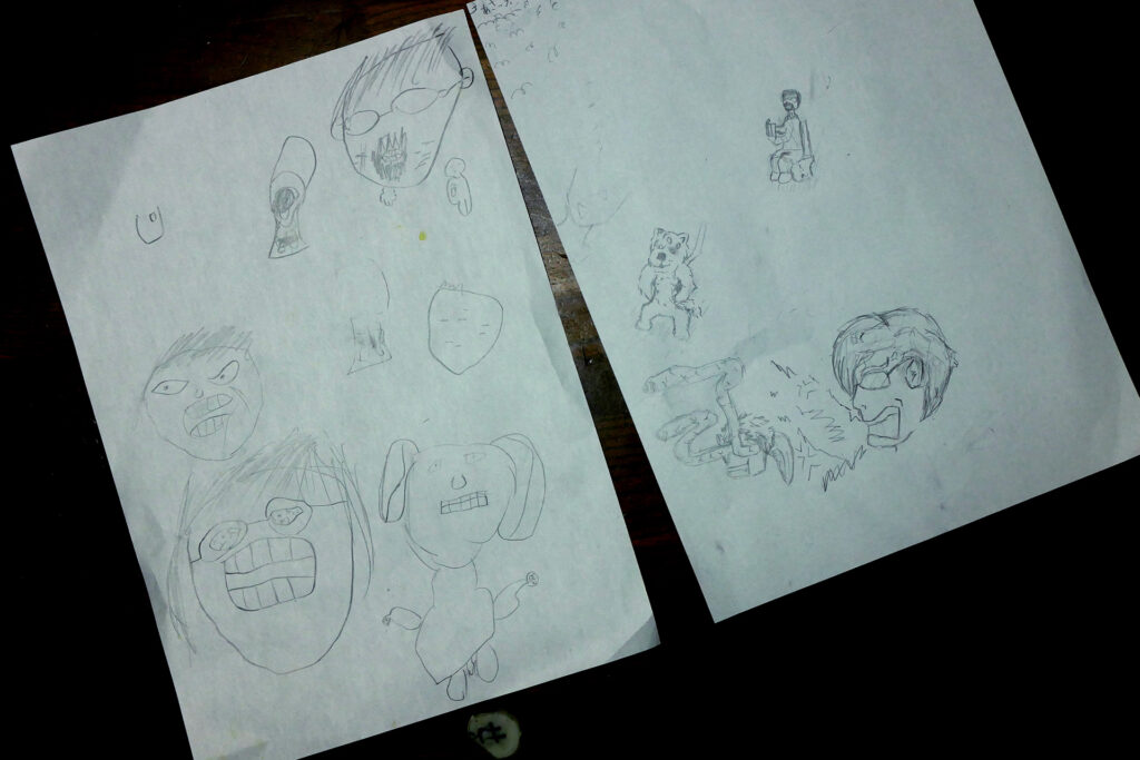 Japanese elementary school kid's drawings on the white paper