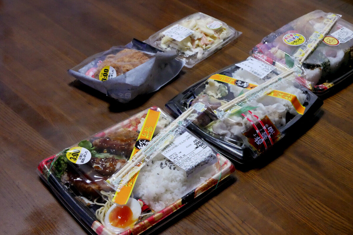 Packed bento Three kind of bento and pre-cooked meals on the table in Hiroshima Japan