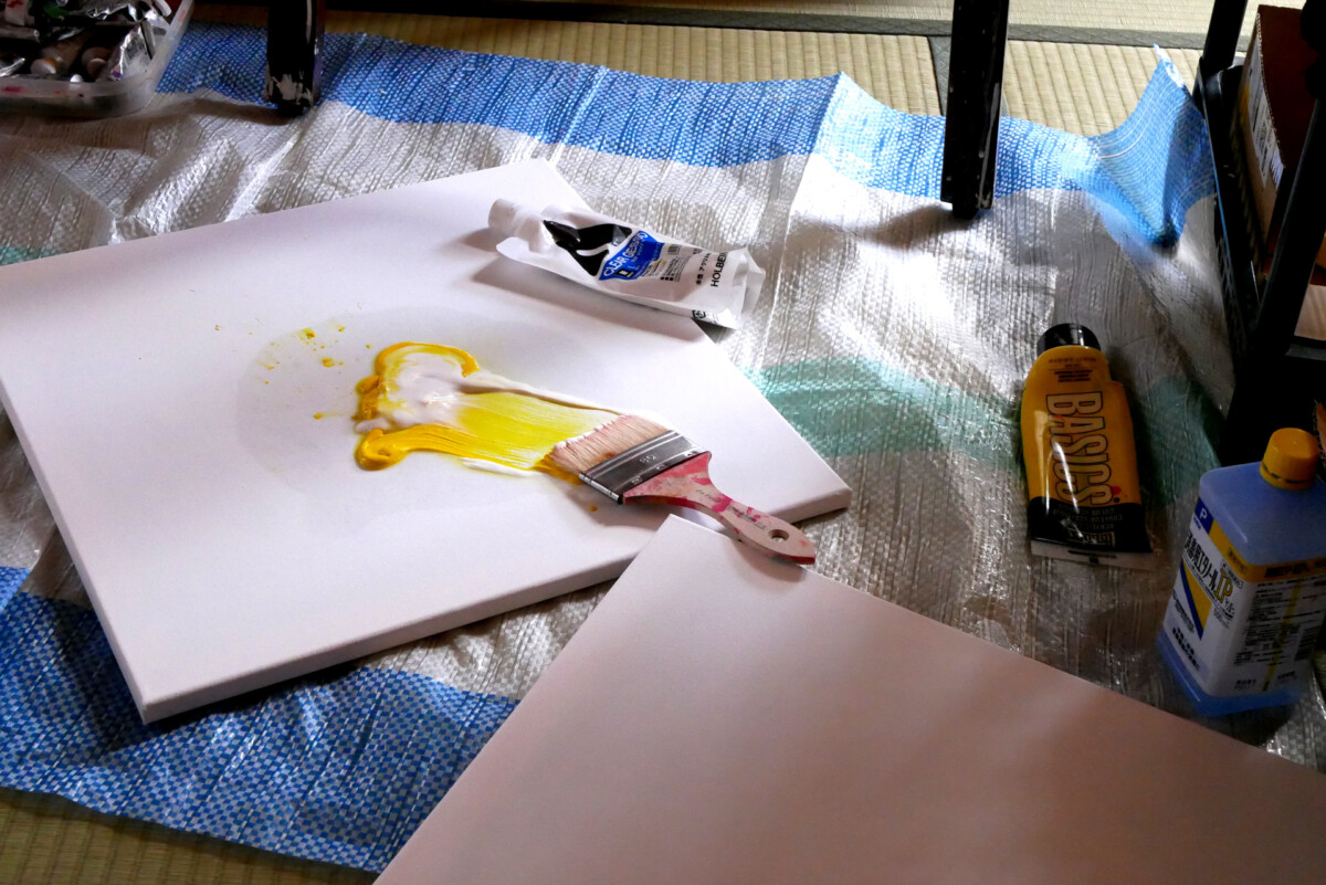 Yellow painting Yellow color by the brush on the canvas