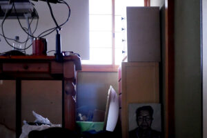 View of Japanese room. There are painting, desk, cable and shoji window