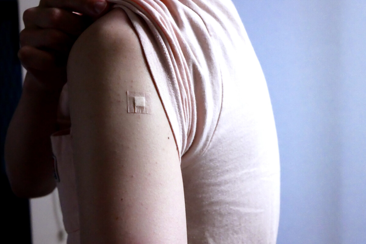 man's arm Covid-19 vaccinated middle aged man's arm