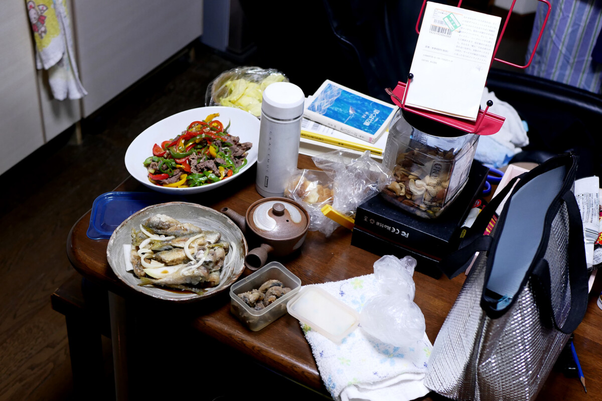 Dishes on the table Japanese home made dishes on the messy table