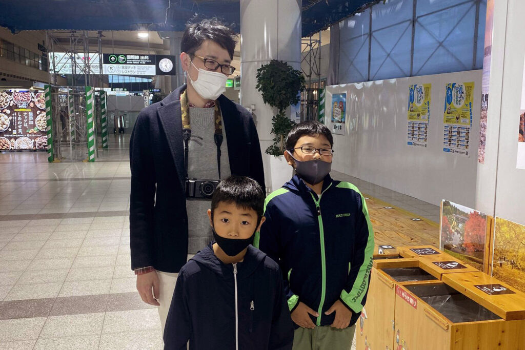 Uncle with nephews at the Hiroshima airport