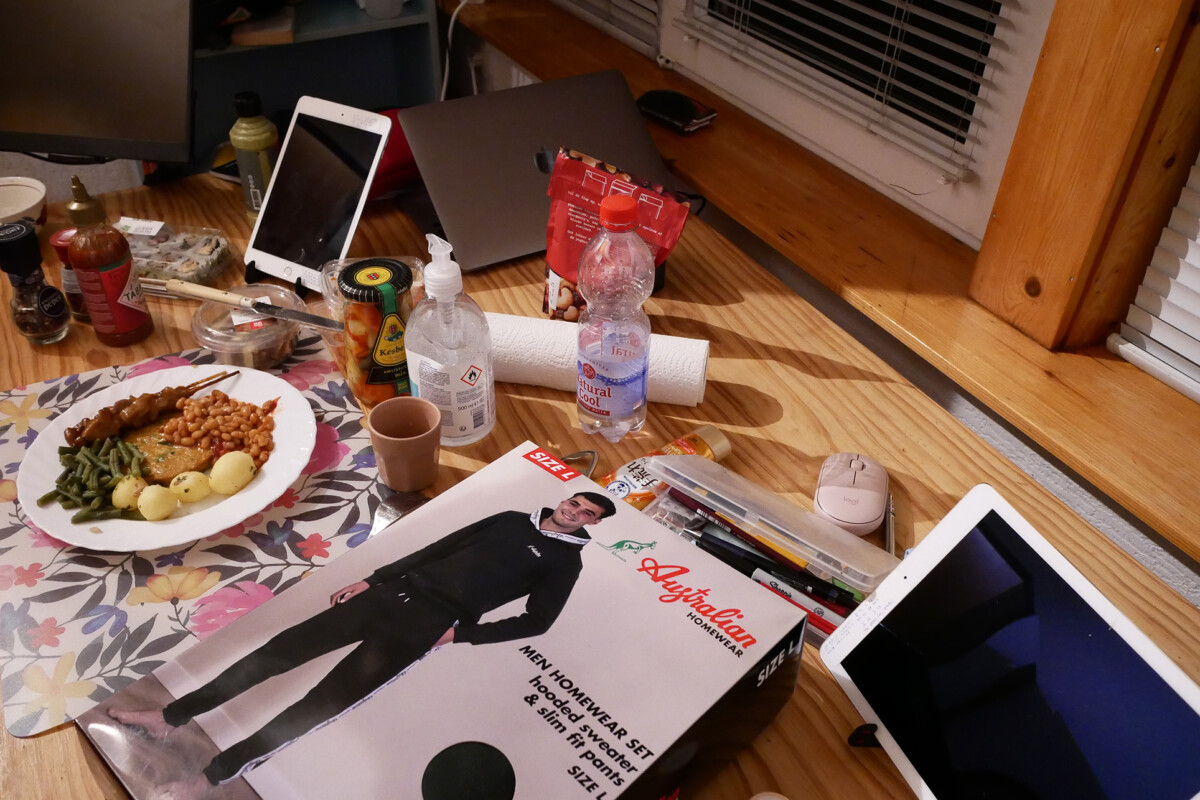 Homewear and dinner Homewear, iPad, beans and potato on the plate, those are on the wooden table