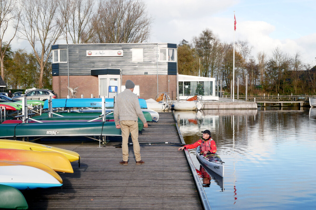 Lake and Kajac Men are talking, Lake and Kajac in the Netherlands