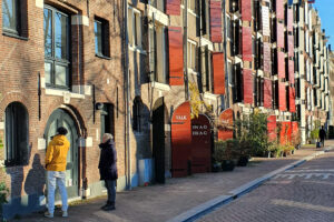 Amsterdam viewing, there are man and woman on the street under the hard lock down of Covid-19 in the Netherlands 2021