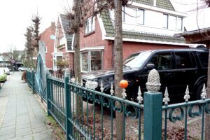 Orange on the fence in the street in the Netherlands