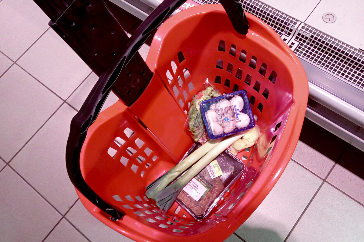 A red color chopping cart in the supermarket in the Netherlands