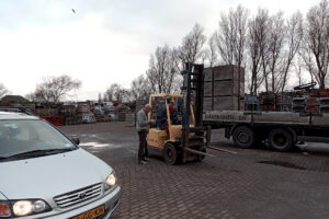 Toyota Car, a old Dutch man asks something to the labor in the Netherlands