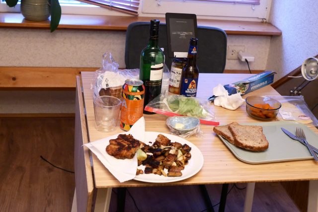 Easy cooking dinner with beer and wine on the wooden table