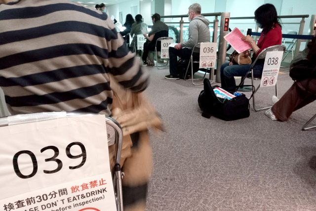 Waiting line for PCR test in Japan airport under Pandemic Covid-19