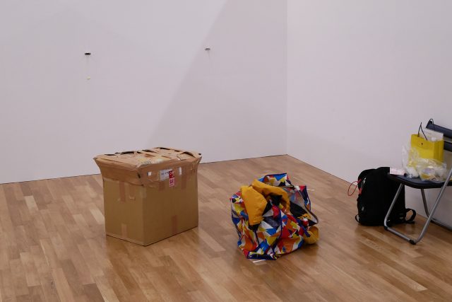 A package, bag on the floor, the view of after exhibition