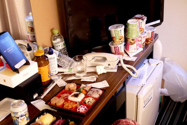 Quarantine messy hotel room, there are bento, instant cup miso soups