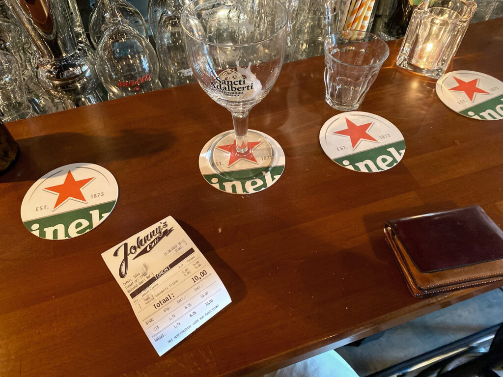 At the bar, Johnny's Cafe, a 10EUR receipt on the counter in the Netherlands