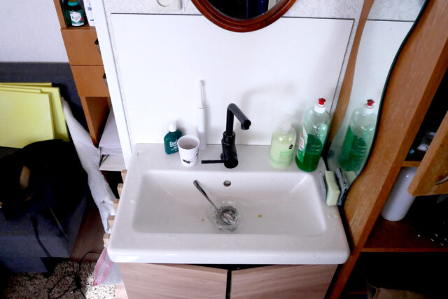 Washing dishes on the basin in the Netherlands