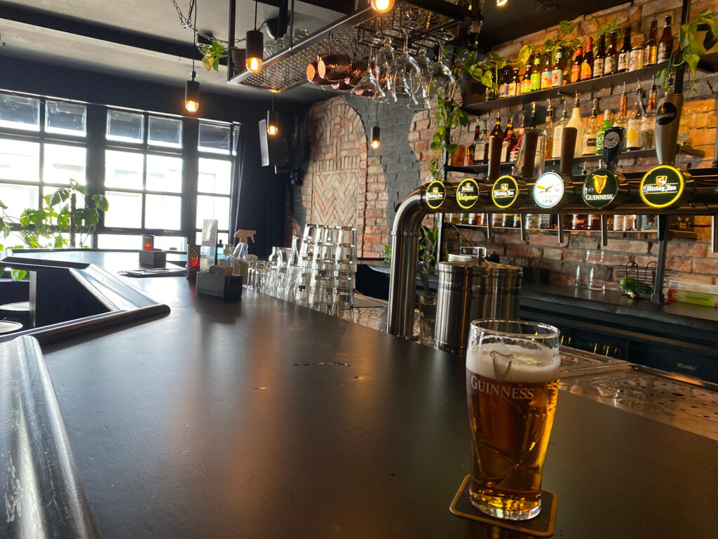 View of the bar, there is a glass of beer