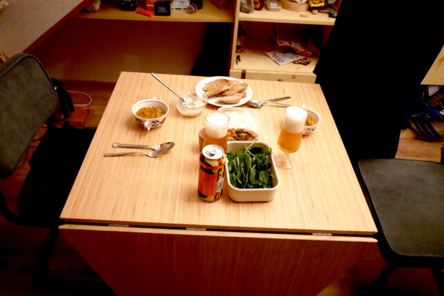 curry spinach beer dinner on the table.jpg