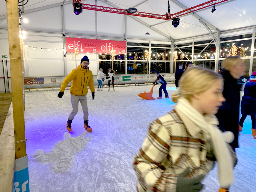 asian man plays ice skate