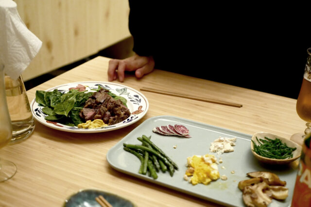 variety of dishes meat veggies on the table