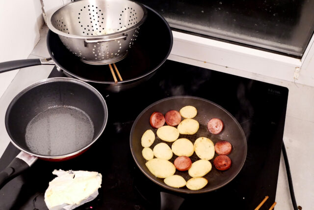 cooking sausage and potatos