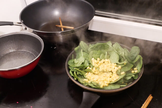 cooking spinach and corn